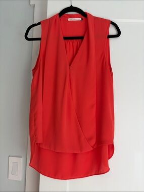 Three Eighty Two Monroe Surplice Top  in Orange with High Low Hemline